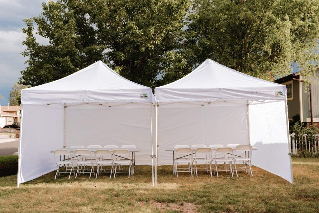 10x20 Pop-up tent with tables and chairs set up
